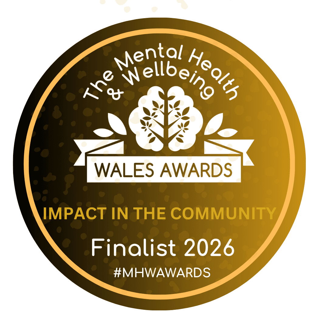 The Mental Health and Wellbeing Wales Awards Impact in the Community Finalist 2026 badge